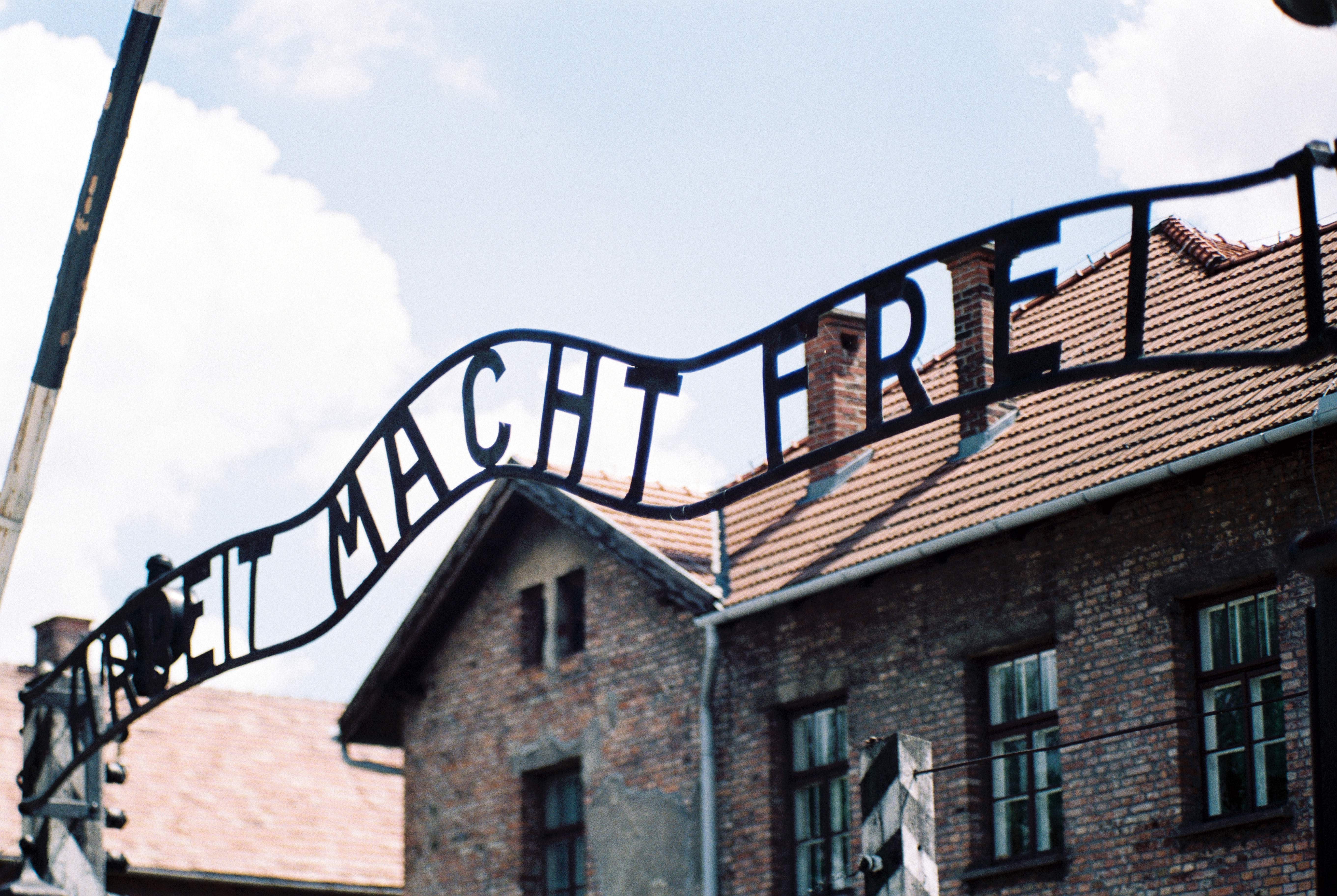 Entrance gate of the former Auschwitz concentration camp with the Scriptures "Arbeit Macht Frei" Eingangstor des ehemaligen Konzentrationslagers Auschwitz mit der Schrift "Arbeit Macht Frei"